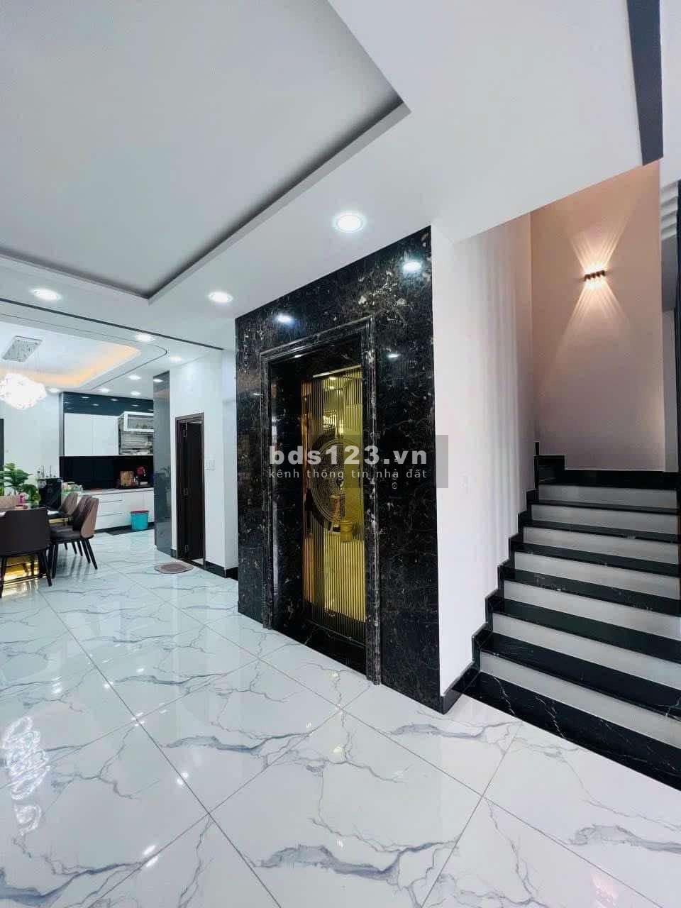 Bán nhà quận Bình Tân - Chủ định cư bán gấp nhà hai mặt hẻm xe hơi - Có thang máy riêng - 11.5 T