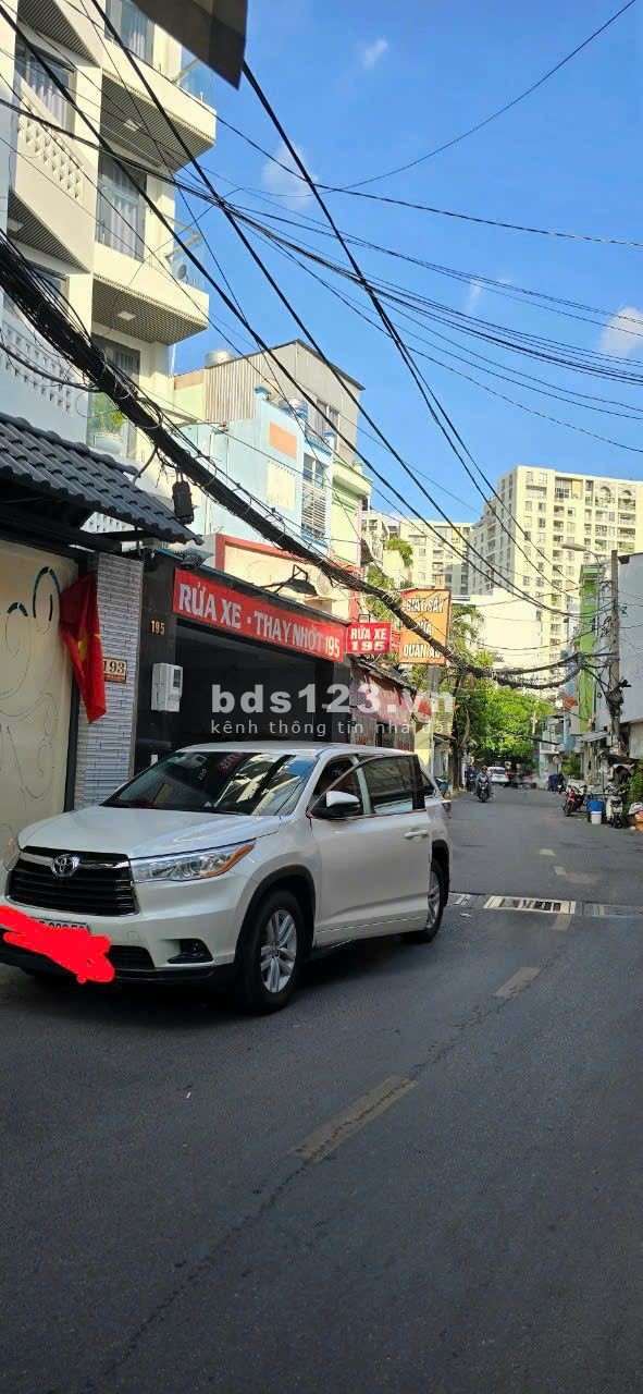 Bán nhà HXH Nguyễn Văn Công, nhà 4 tấm mới 100% dt 4x14m với 5PN có cửa sổ, giá 8.6 tỷ BL