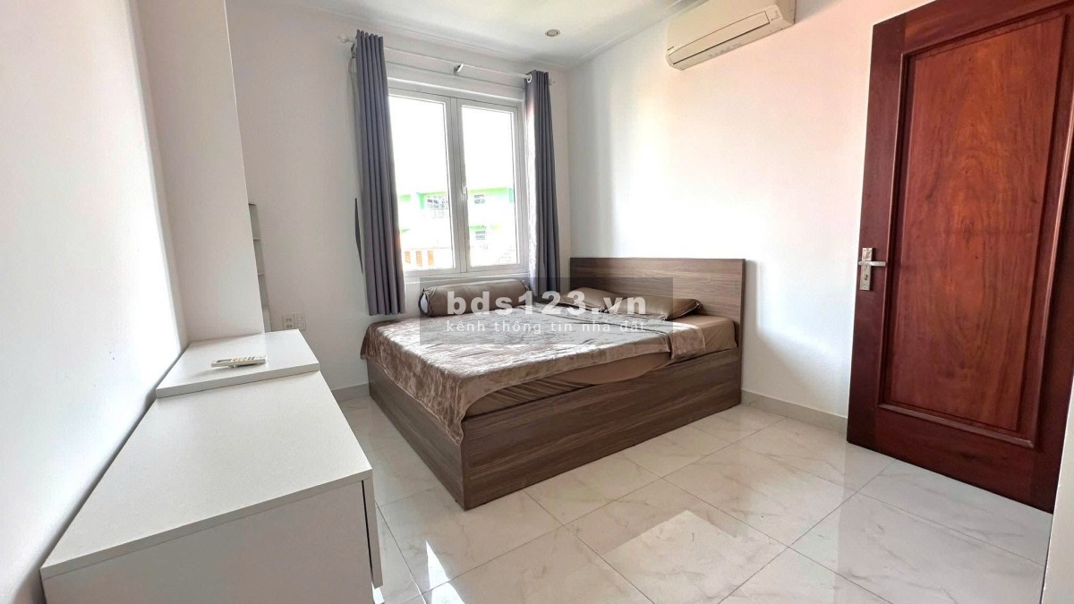 Chung cư Khải Hoàn, Lạc Long Quân, p5, Q11: 95m2, 2p ngủ, NT, 13tr/th