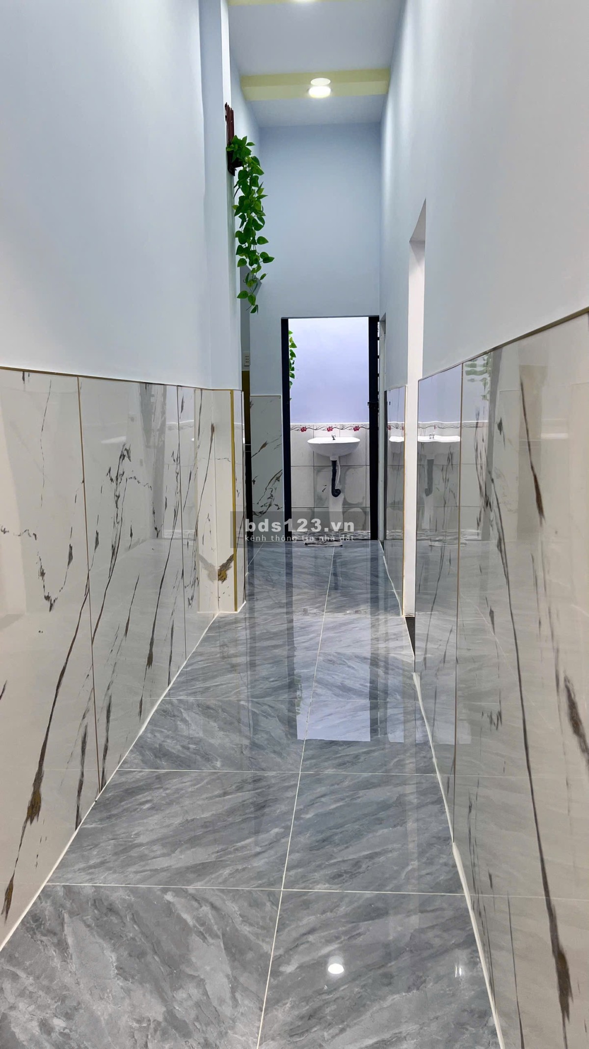 Nhà bán đường Quốc lộ 50 - DT = 4m x 12m, nở Hậu - 7m 2 PN - 1 toilet, 1PN, khách