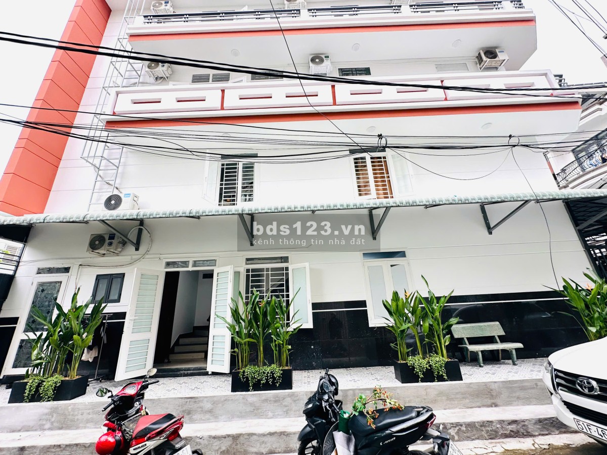 Bán tòa nhà 13 phòng CHDV, căn góc 2 mặt tiền hẻm xe hơi, dòng…