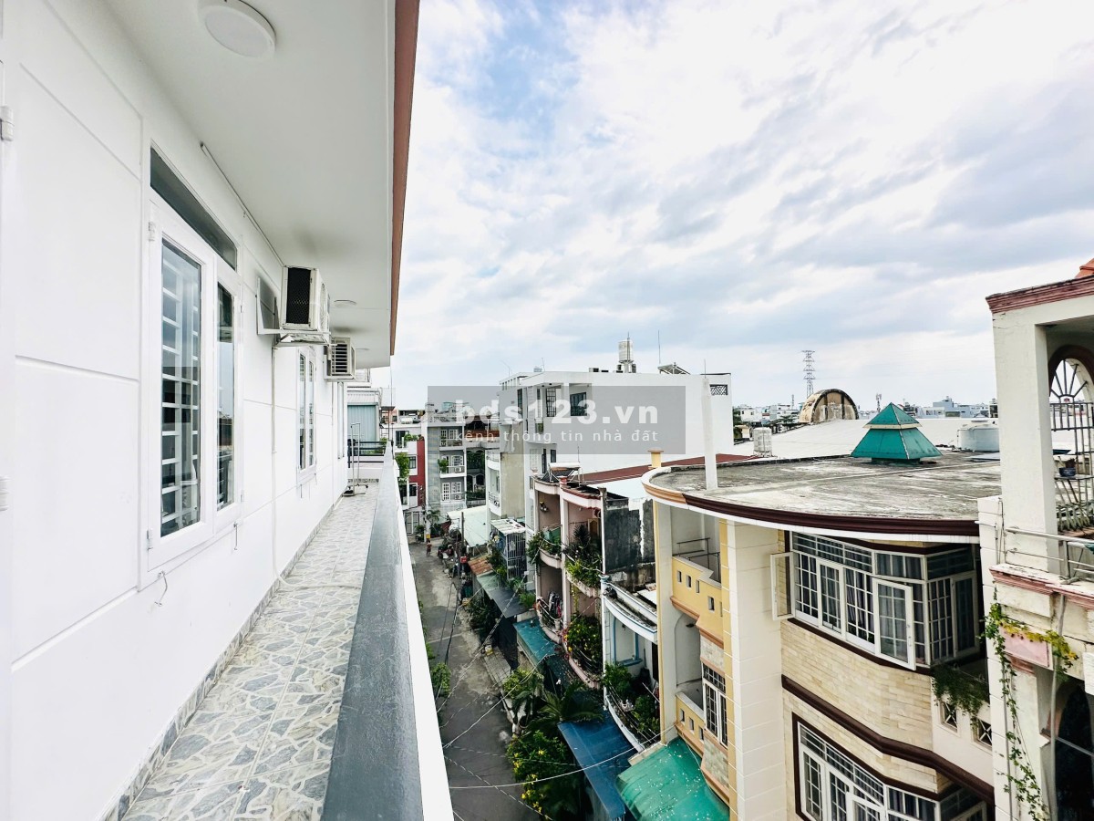 Bán tòa nhà 13 phòng CHDV, căn góc 2 mặt tiền hẻm xe hơi, dòng…